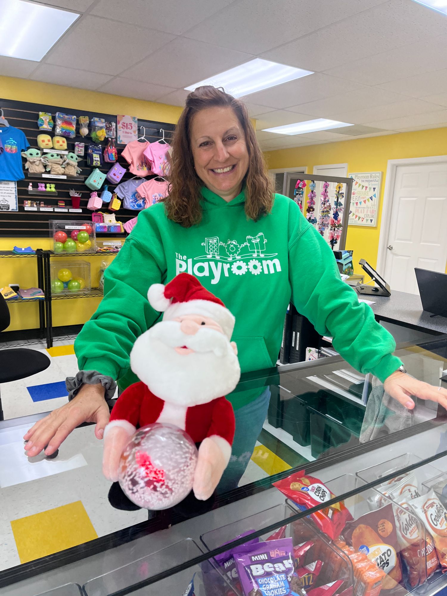 Miss Keri, owner of The Playroom in Forest Hill, MD greets you at the front desk with a warm, welcoming smile!
